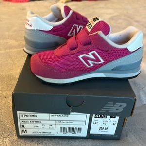 Kids pink new balance shoes